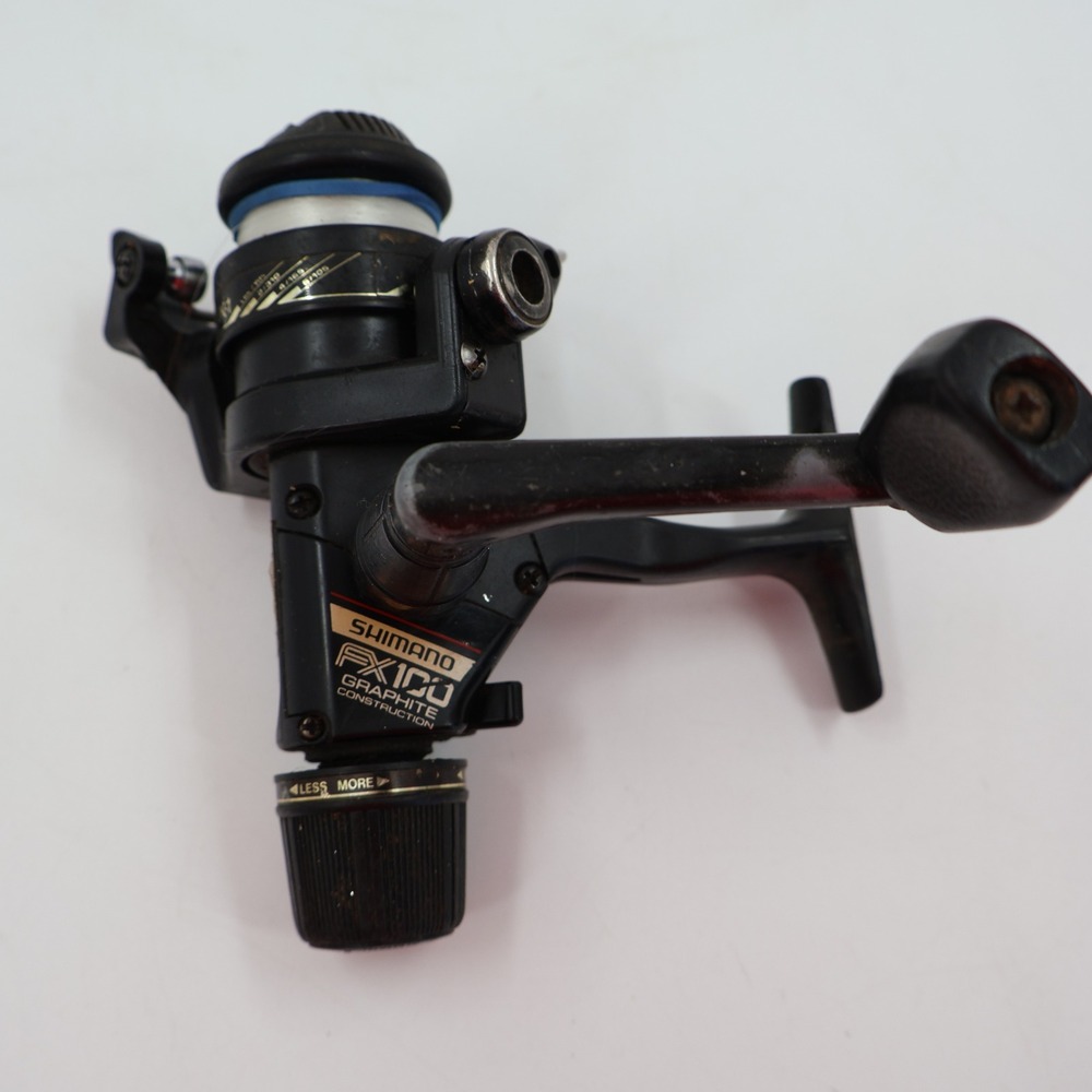 Shimano FX100 Spinning Reel Unisex OS Black Graphite Rear Drag RK-1 Spool